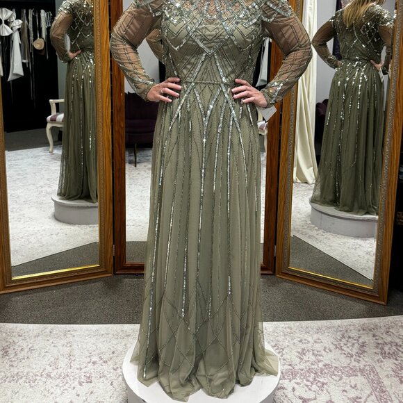 Sage green gown with sheer sleeves and all-over Art Deco beading. -  threedaughtersproperties.com